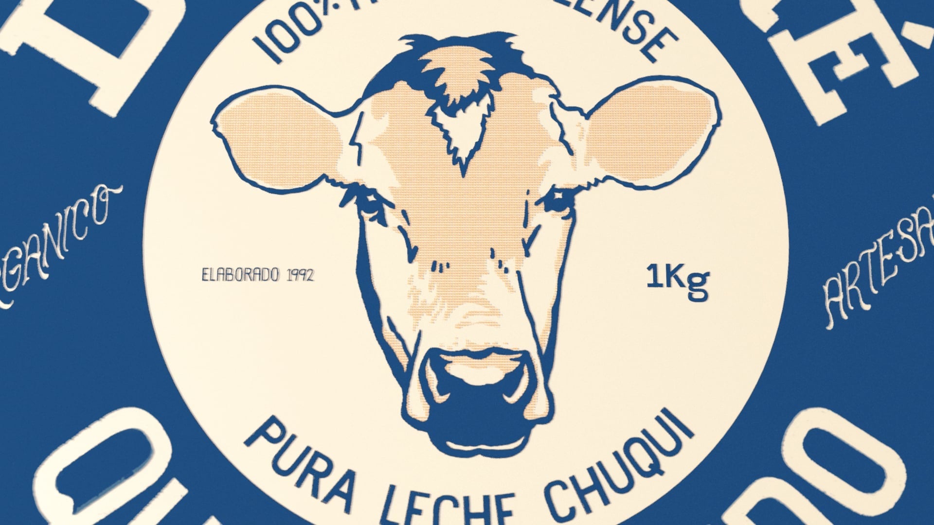 Close-up detail of the Don Rene cheese label, featuring a realistic illustration of a cow and '100% Hermosillense' quality seal.